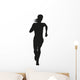 Silhouette of a woman running long distance Wall Decal