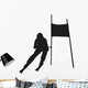 Vector silhouette of the skier passing gate Wall Decal