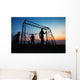 Boys playing football on the beach in summer Wall Decal