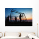 Boys playing football on the beach in summer Wall Decal