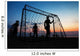 Boys playing football on the beach in summer Wall Decal