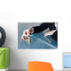 Businesswoman building growing euro columns Wall Decal