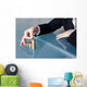 Businesswoman building growing euro columns Wall Decal