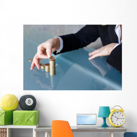 Businesswoman building growing euro columns Wall Decal