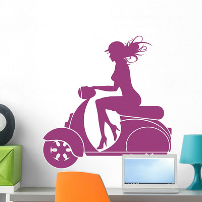 Girl Scooter Wall Decal shown on a wall