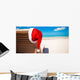 Red santa hat on chair longue at tropical caribbean beach Wall Decal