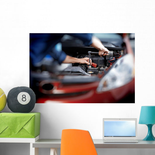 Mechanic working in auto repair garage Wall Decal