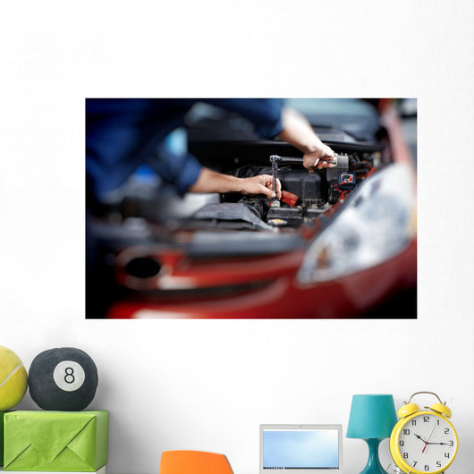 Mechanic working in auto repair garage Wall Decal