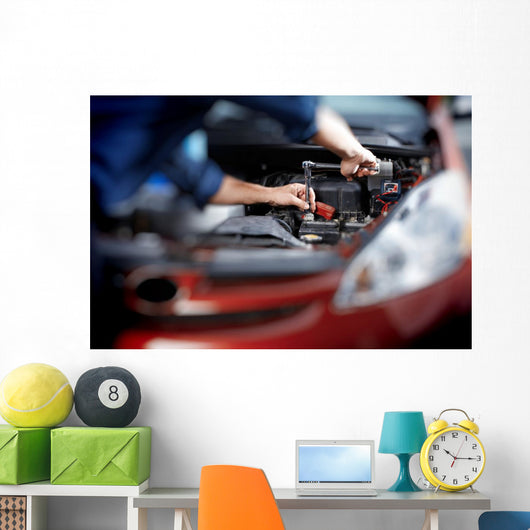 Mechanic working in auto repair garage Wall Decal