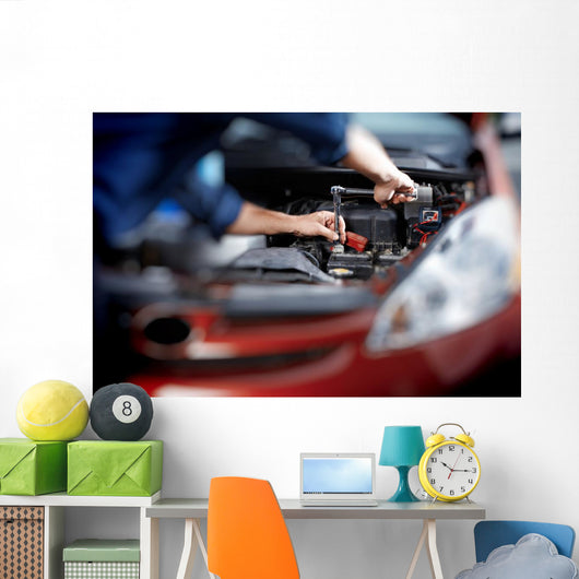 Mechanic working in auto repair garage Wall Decal