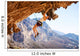 Young female rock climber on overhanging cliff Wall Decal