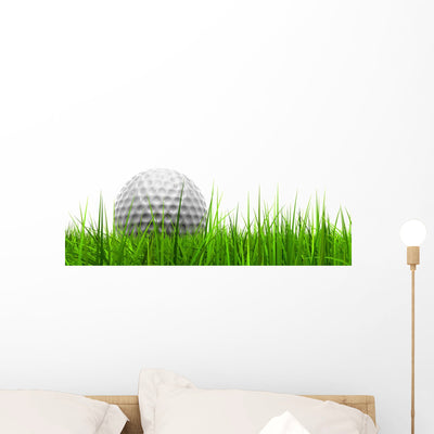 White Golf Ball In Grass Wall Decal shown on a wall