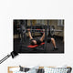 young man doing bench press workout in gym Wall Decal