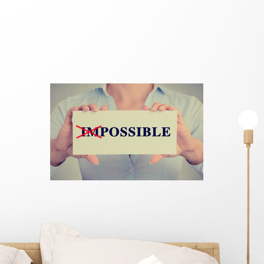 woman hands card crossed off first two letters word impossible Wall Decal