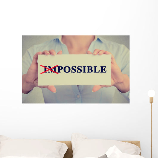 woman hands card crossed off first two letters word impossible Wall Decal