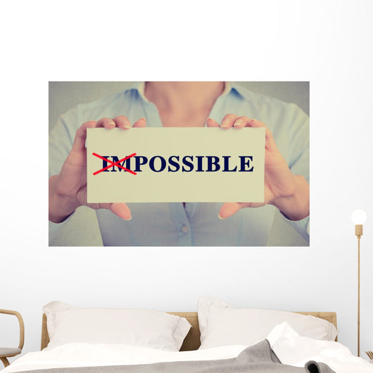 woman hands card crossed off first two letters word impossible Wall Decal