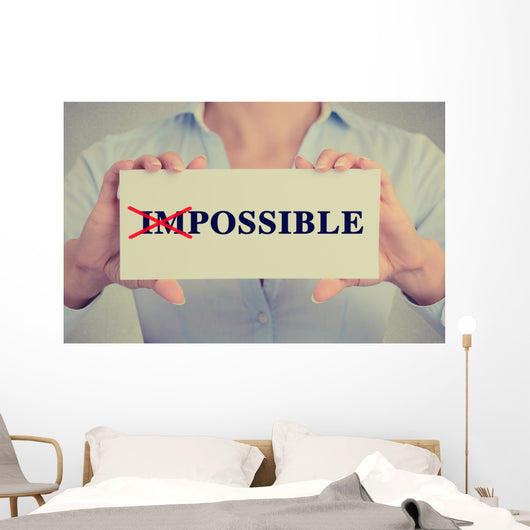woman hands card crossed off first two letters word impossible Wall Decal