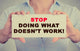 Businesswoman hands holding sign Stop Doing What Doesn't Work Wall Decal