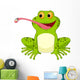 Happy frog cartoon catching fly Wall Decal