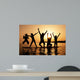Silhouette of kids jumping on the beach Wall Decal
