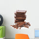Broken chocolate bar on a white background Wall Decal