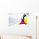 snowboarder woman sitting on snow mountain slope Wall Decal