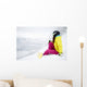 snowboarder woman sitting on snow mountain slope Wall Decal