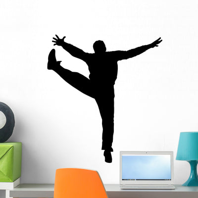 Sporty Acrobatic Jump Wall Decal shown on a wall