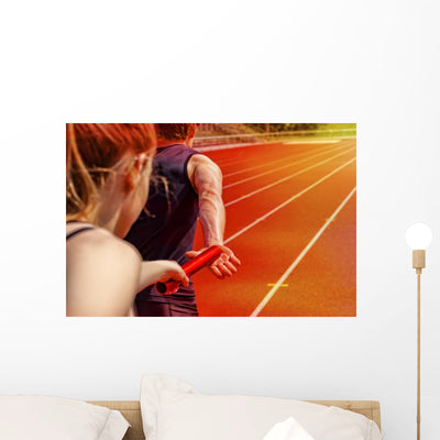 Relay Race Handing Over Female Male Wall Decal shown on a wall