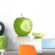 Green apple with bite taken out, on white Wall Decal