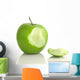 Green apple with bite taken out, on white Wall Decal