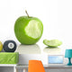 Green apple with bite taken out, on white Wall Decal
