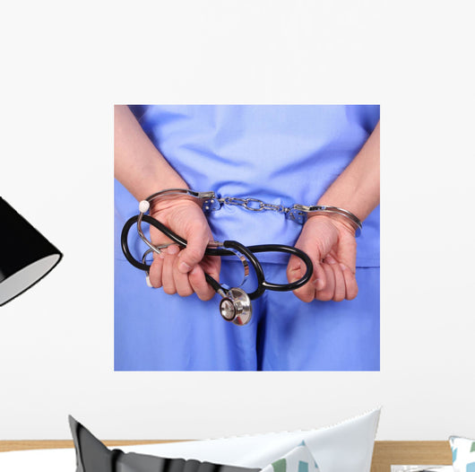 Doctor with stethoscope in handcuffs Wall Decal