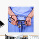 Doctor with stethoscope in handcuffs Wall Decal