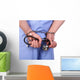 Doctor with stethoscope in handcuffs isolated on white Wall Decal