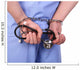 Doctor with stethoscope in handcuffs isolated on white Wall Decal