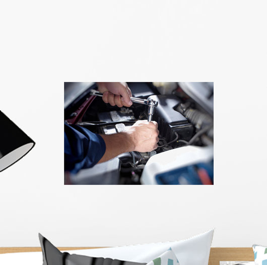 Mechanic working in auto repair garage Wall Decal