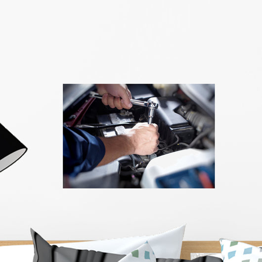 Mechanic working in auto repair garage Wall Decal