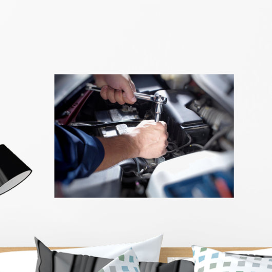 Mechanic working in auto repair garage Wall Decal