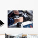 Mechanic working in auto repair garage Wall Decal