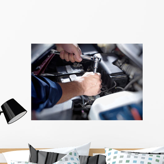 Mechanic working in auto repair garage Wall Decal