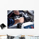 Mechanic working in auto repair garage Wall Decal