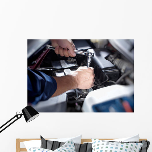 Mechanic working in auto repair garage Wall Decal