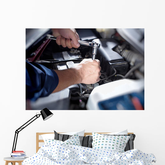 Mechanic working in auto repair garage Wall Decal