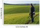 Gamekeeper walks over field. Wall Decal