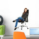 Young happy student woman sitting on a wheel chair Wall Decal