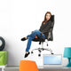 Young happy student woman sitting on a wheel chair Wall Decal
