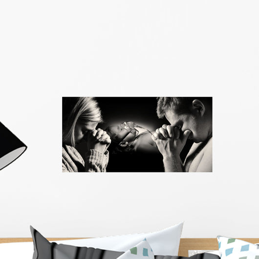 Parents pray for the health of seriously ill daughter. Wall Decal
