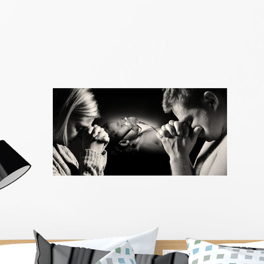 Parents pray for the health of seriously ill daughter. Wall Decal
