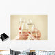 Glasses of champagne in female hands on a party Wall Decal